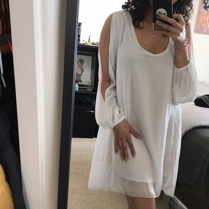 Open arm long sleeve dress